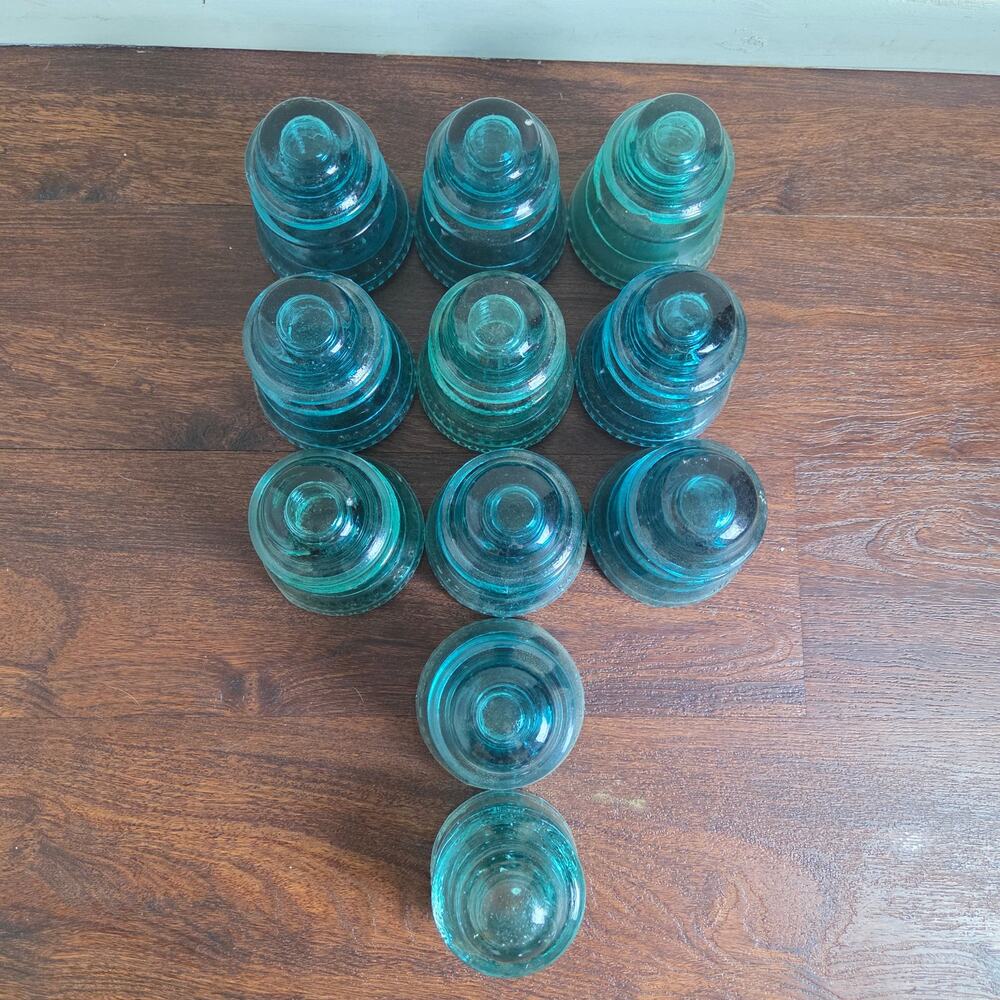 11 Antique Teal Glass Insulators - 10 Hemingray #42 & 1 Lynchburg #38